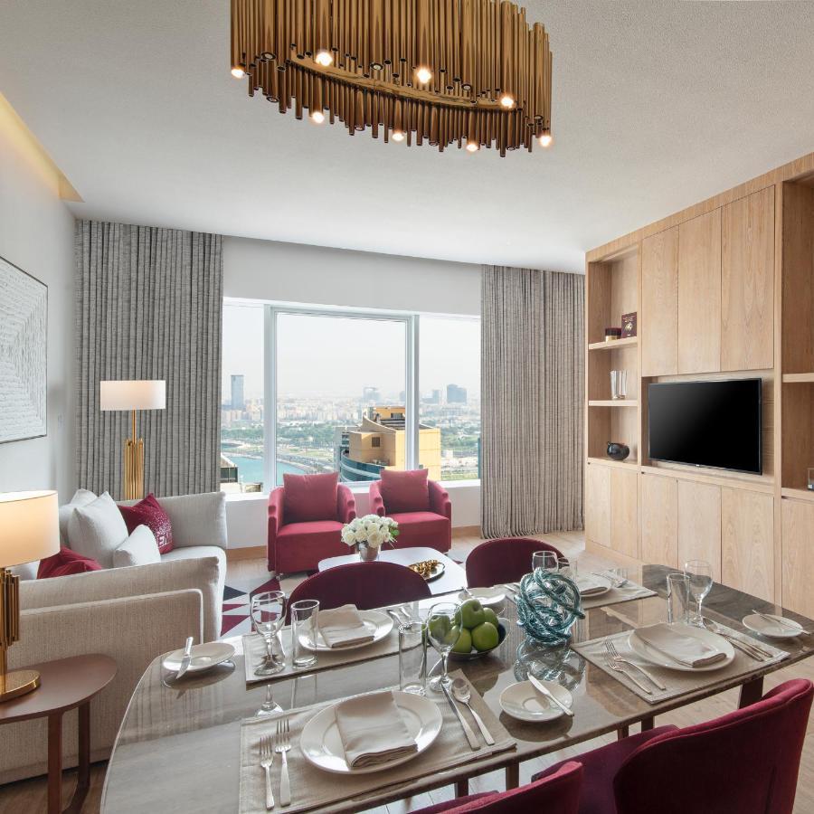The Bentley Luxury Hotel & Suites Doha Exterior foto Living room