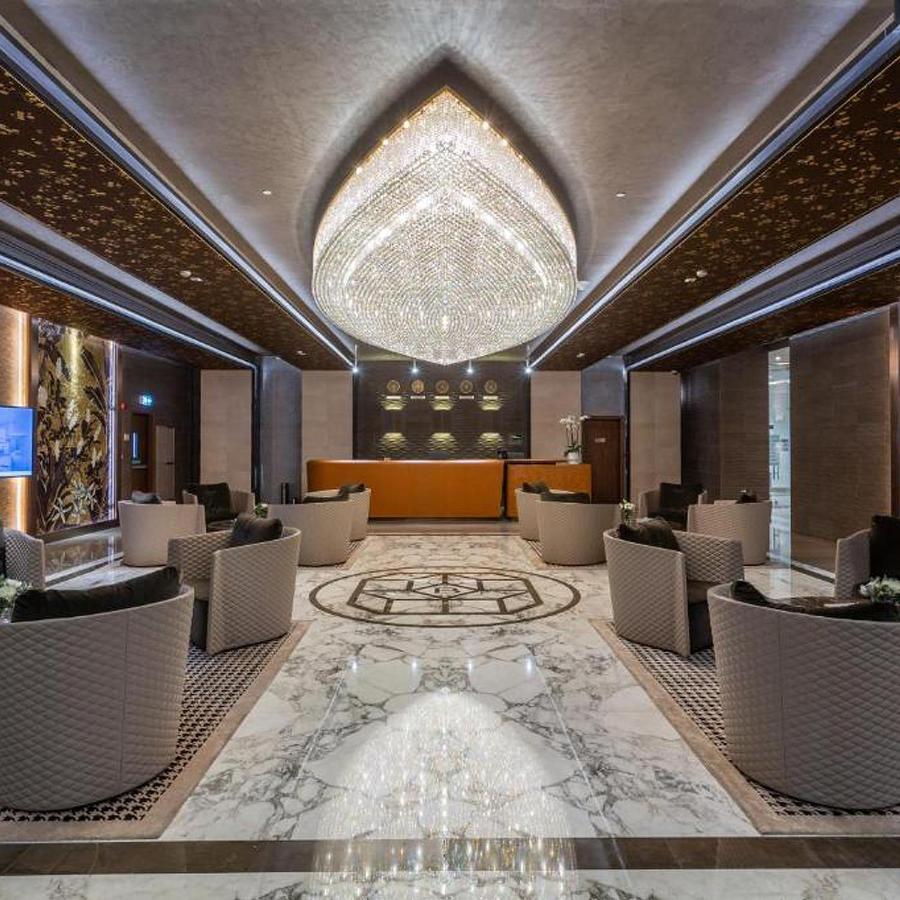 The Bentley Luxury Hotel & Suites Doha Exterior foto The interior of the lounge
