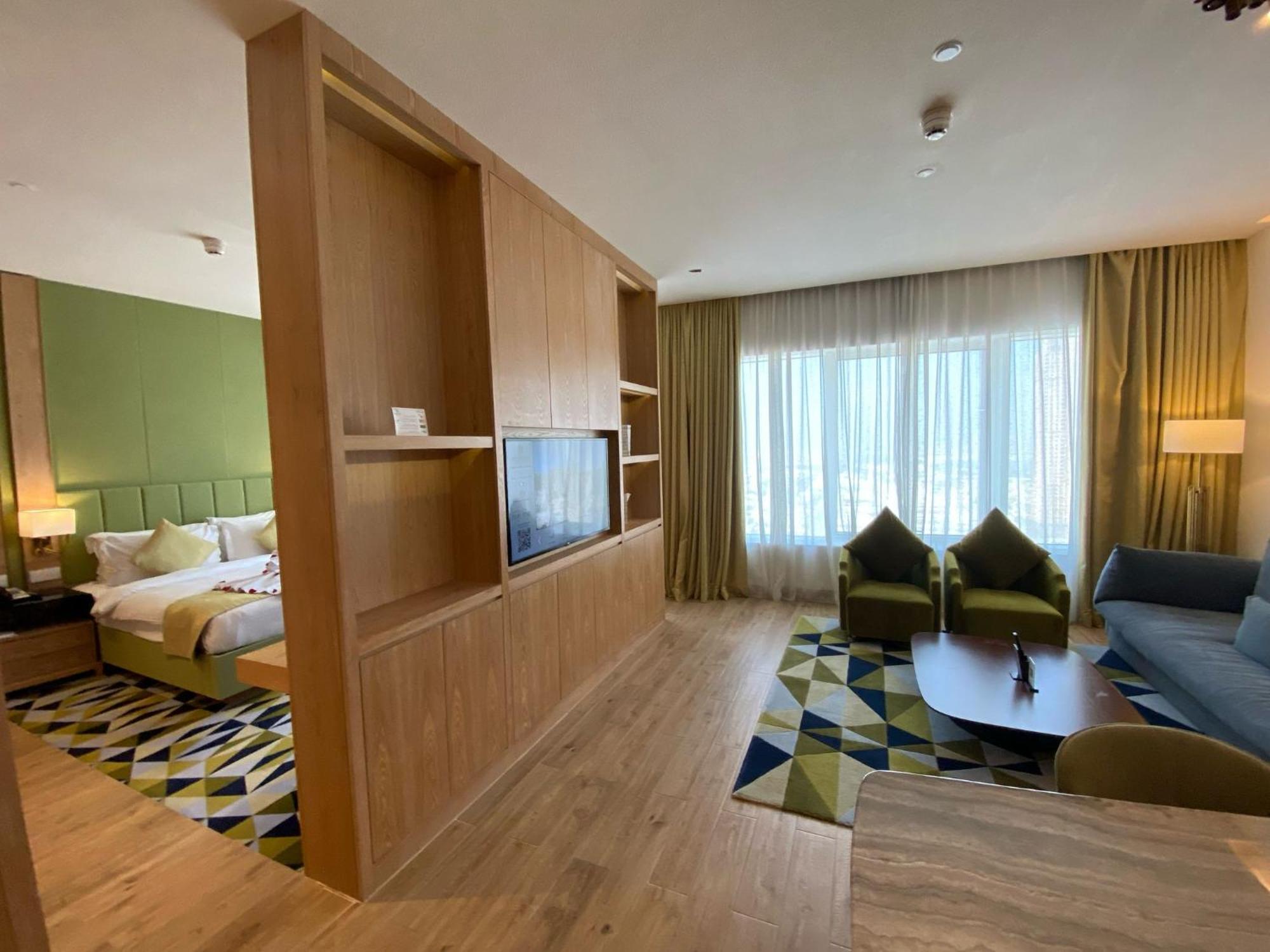 The Bentley Luxury Hotel & Suites Doha Exterior foto A suite at the hotel